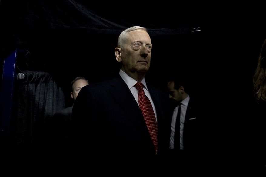 Retired Marine Corps Gen. James Mattis stands backstage as he waits to be announced by President-elect Donald Trump as his Defense Secretary at a rally at the Crown Coliseum in Fayetteville, N.C., Tuesday, Dec. 6, 2016. (AP Photo/Andrew Harnik)