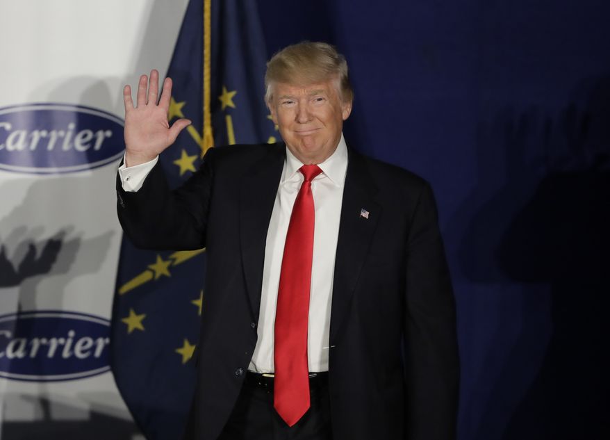 In this Thursday, Dec. 1, 2016, photo, President-elect Donald Trump arrives at Carrier Corp in Indianapolis. Trump is slated to hold the second stop of this "thank you" tour Tuesday, Dec. 6, in North Carolina, less than a week after his bombastic return to rallies at an Ohio appearance that felt more like a raucous campaign stop than a traditional speech by a president-to-be. (AP Photo/Darron Cummings)
