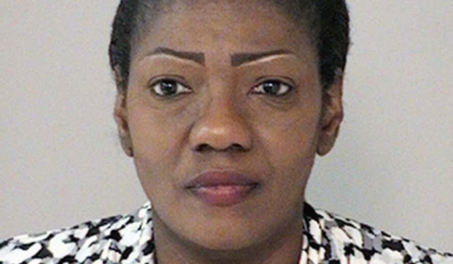 This undated photo provided by the Fort Bend County Sheriff's Office in Richmond, Texas, shows Paula Sinclair, who has been arrested and faces charges that include injury to a child. A sheriff says seven special-needs teenagers aged 13 to 16 years old have been removed from "deplorable" conditions at the Houston-area home where they were locked for long periods in a closet by Sinclair, their adoptive mother. The teens were removed Nov. 23, 2016. (Fort Bend County Sheriff's Office via AP)