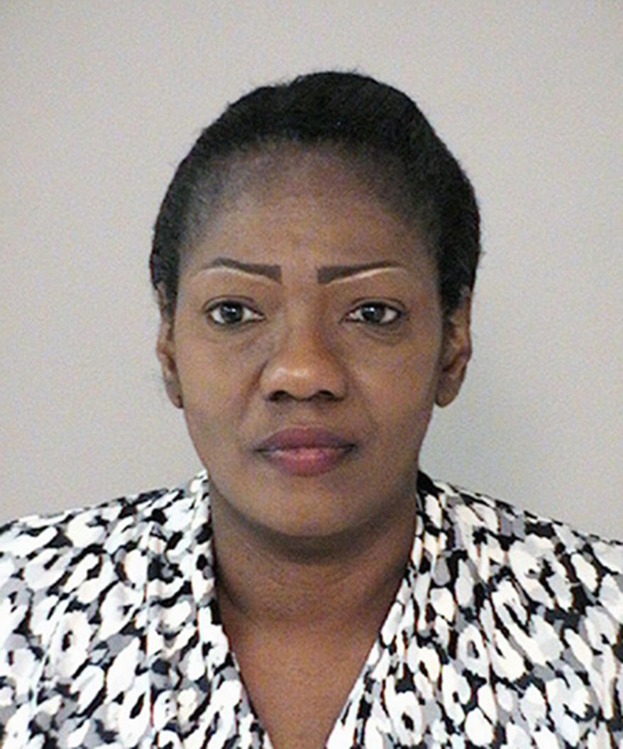 This undated photo provided by the Fort Bend County Sheriff's Office in Richmond, Texas, shows Paula Sinclair, who has been arrested and faces charges that include injury to a child. A sheriff says seven special-needs teenagers aged 13 to 16 years old have been removed from "deplorable" conditions at the Houston-area home where they were locked for long periods in a closet by Sinclair, their adoptive mother. The teens were removed Nov. 23, 2016. (Fort Bend County Sheriff's Office via AP)