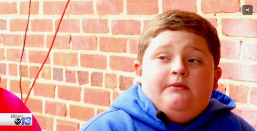 Anthony Mayse, 9, was told by a Santa Claus in Forest City, North Carolina, to "lay off the hamburgers." The family wants the mall employee fired. (WLOS-13 ABC screenshot)
