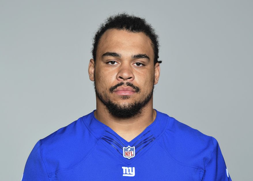 FILE - This is a 2016 file photo showing Nikita Whitlock of the New York Giants NFL football team. Police are investigating a break-in and racist graffiti scrawled on the wall at the New Jersey home of an injured New York Giants player. Moonachie police Sgt. Richard Behrens tells The Record police are investigating the break-in at Nikita Whitlock's home as a hate crime. Whitlock, who's black, showed the graffiti to reporters, including "KKK" and a swastika. The name "Trump" was also written on the wall in marker. (AP Photo/File)