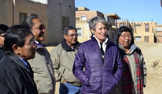 U.S. Interior Secretary Sally Jewell, second from right, tours Acoma Pueblo, a nearly thousand-year-old village that&#39;s situated atop a New Mexico mesa, with tribal leaders on Thursday, Dec. 8, 2016. Jewell says the visit to Acoma Pueblo is expected to be her last to a reservation as secretary of the Interior, which oversees the Bureau of Indian Affairs. (AP Photo/Mary Hudetz)