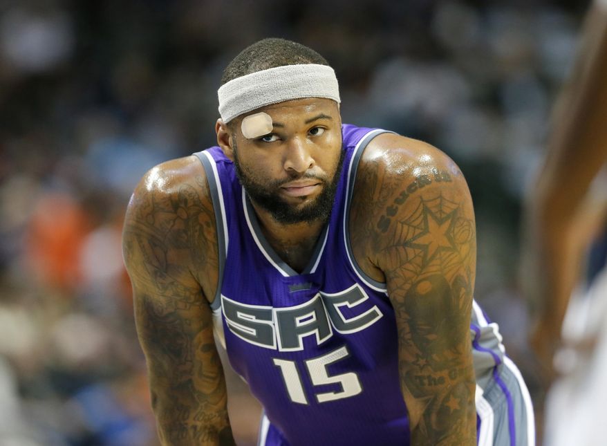 In this Dec. 7, 2016 photo, Sacramento Kings' DeMarcus Cousins (15) waits for an in bound during an NBA basketball game against the Dallas Mavericks in Dallas. Cousins and teammate Matt Barnes are being sued after a Dec. 5, 2016 nightclub altercation in New York. The federal court lawsuit filed Wednesday, Dec 7, says a couple was attacked Monday at a nightclub in Manhattan's Chelsea neighborhood. (AP Photo/Tony Gutierrez)