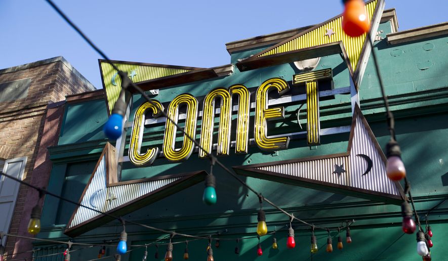 In this Dec. 5, 2016, photo, the front door of Comet Ping Pong pizza shop, in Washington, Monday, Dec. 5, 2016. (AP Photo/Jose Luis Magana) ** FILE **