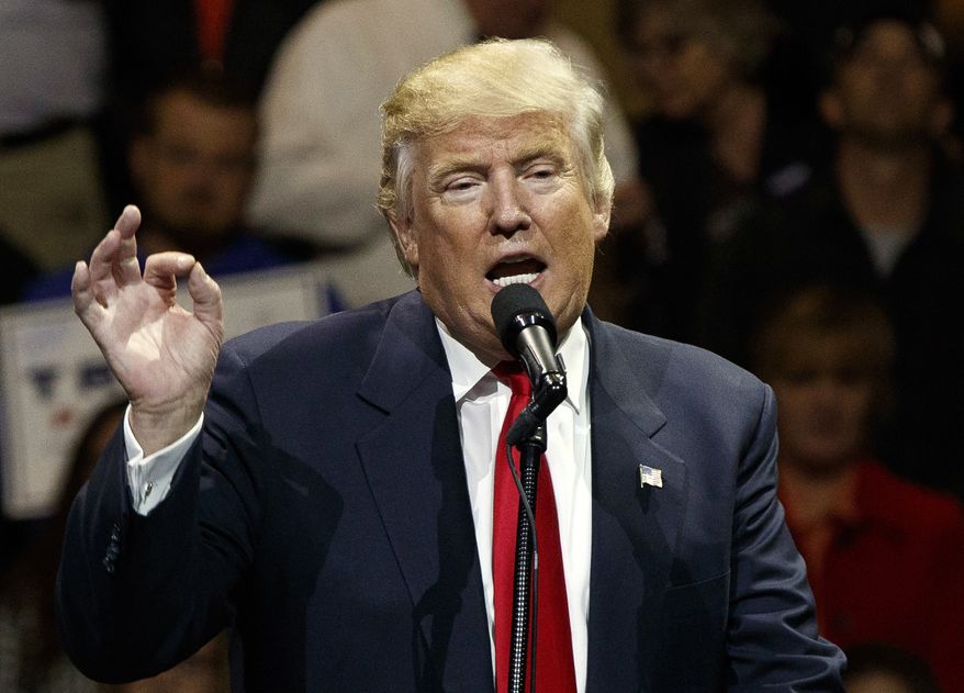 FILE - In this Thursday, Dec. 1, 2016 file photo, U.S. President-elect Donald Trump speaks during a "USA Thank You" tour event in Cincinnati. An official Chinese newspaper Tuesday, Dec. 12, 2016, called Donald Trump "as ignorant as a child" on Monday after the president-elect again suggested that he was reconsidering how America deals with Taiwan, one of the most sensitive issues in the relationship between the U.S. and China. (AP Photo/Evan Vucci, File)