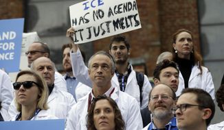 Scientists hold signs during a rally in conjunction with the American Geophysical Union&#39;s fall meeting Tuesday, Dec. 13, 2016, in San Francisco. The rally was to call attention to what scientist believe is unwarranted attacks by the incoming Trump administration against scientists advocating for the issue of climate change and its impact. (AP Photo/Marcio Jose Sanchez) **FILE**