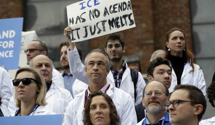 Scientists hold signs during a rally in conjunction with the American Geophysical Union&#x27;s fall meeting Tuesday, Dec. 13, 2016, in San Francisco. The rally was to call attention to what scientist believe is unwarranted attacks by the incoming Trump administration against scientists advocating for the issue of climate change and its impact. (AP Photo/Marcio Jose Sanchez) **FILE**