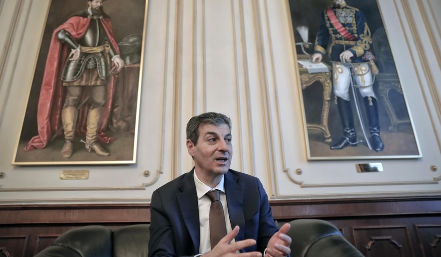 Romanian Defense Minister, Mihnea Motoc, speaks during an interview with the Associated Press in Bucharest, Romania, Tuesday, Dec. 13, 2016. Motoc says his country will be strengthening its defenses after being faced with Russia's growing military presence in the Black Sea.(AP Photo/Vadim Ghirda)