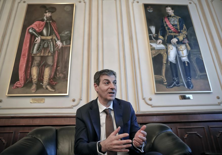 Romanian Defense Minister, Mihnea Motoc, speaks during an interview with the Associated Press in Bucharest, Romania, Tuesday, Dec. 13, 2016. Motoc says his country will be strengthening its defenses after being faced with Russia's growing military presence in the Black Sea.(AP Photo/Vadim Ghirda)
