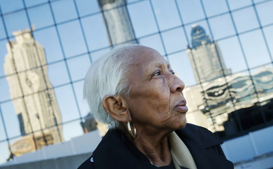 In this Jan. 11, 2016, file photo, Doris Payne poses for a photo in Atlanta. Police just outside Atlanta say a notorious 86-year-old jewel thief has struck again. Dunwoody, Ga., police say Payne was arrested Tuesday, Dec. 13, 2016, at a Von Maur department store where police report she put a $2,000 necklace in her back pocket and tried to leave the store. (AP Photo/John Bazemore, File)