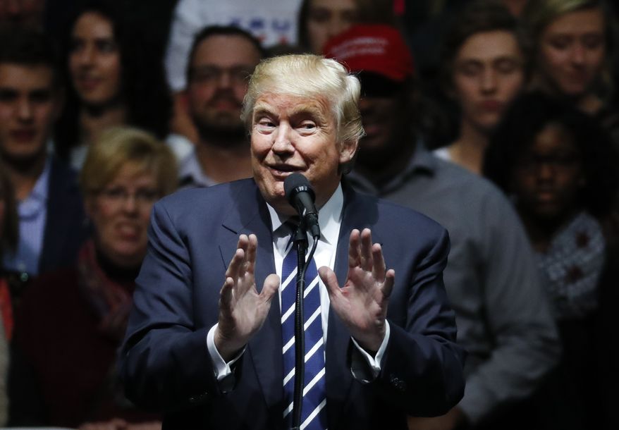 President-elect Donald Trump speaks to supporters during a rally in Grand Rapids, Mich., Friday, Dec. 9, 2016. (AP Photo/Paul Sancya)