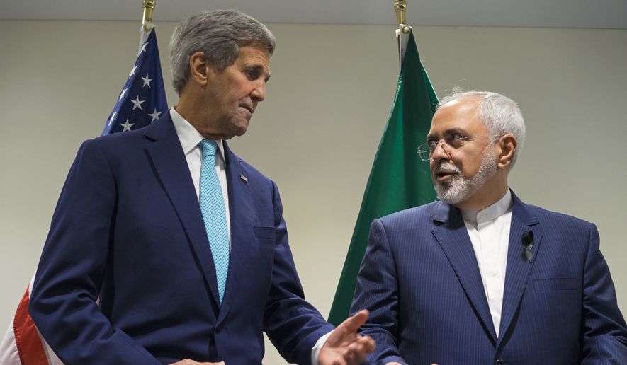 In this Sept. 26, 2015, file photo, Secretary of State John Kerry meets with Iranian Foreign Minister Mohammad Javad Zarif at United Nations headquarters. (AP Photo/Craig Ruttle, File)