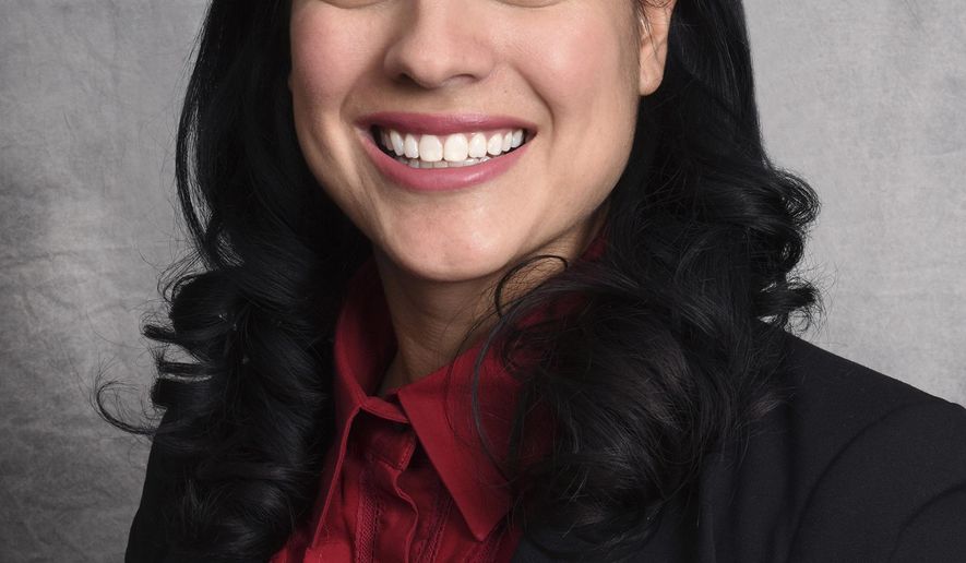 This Dec. 13, 2016 photo provided by the City of Chicago shows the next city clerk, Anna Valencia. Chicago Mayor Rahm Emanuel appointed Valencia, a 31-year-old director in his administration Wednesday, Dec. 14, 2016, as the next city clerk after former Clerk Susana Mendoza was sworn in as Illinois comptroller this month. (City of Chicago via AP)