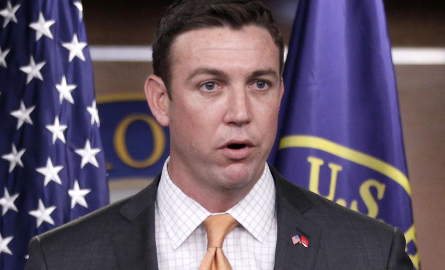 FILE - In this April 7, 2011 file photo, Rep. Duncan Hunter, R-Calif., speaks during a news conference on Capitol Hill in Washington. The House Ethics Committee says it is continuing an investigation into possible ethics violations by Hunter. The panel said in a statement Dec. 15, that it will take up an inquiry launched by the independent Office of Congressional Ethics. (AP Photo/Carolyn Kaster, File)