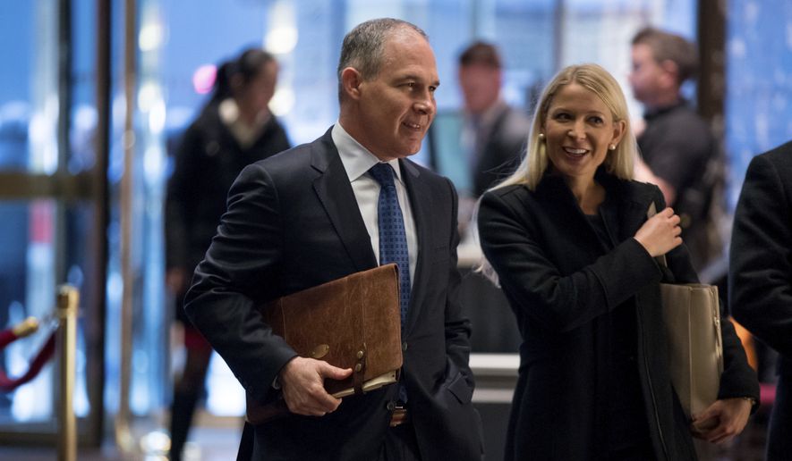 In this Dec. 7, 2016 photo, EPA Administrator-designate Oklahoma Attorney General Scott Pruitt arrives at Trump Tower in New York. Propelled by populist energy, President-elect Donald Trumps candidacy broke long-standing conventions and his incoming Cabinet embodies a sharp turn from the outgoing Obama administration. (AP Photo/Andrew Harnik, File)