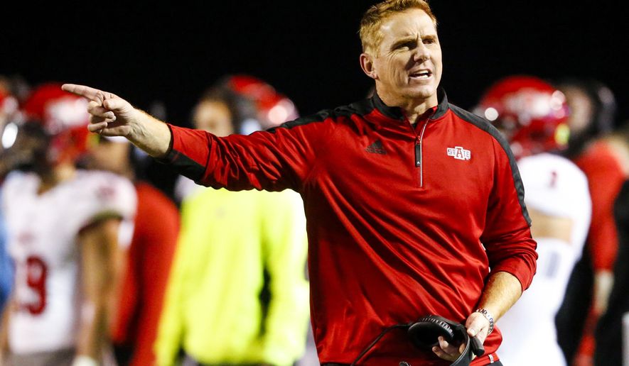 FILE - In this Nov. 17, 2016, file photo, Arkansas State coach Blake Anderson reacts to a call during the second half of the team&#39;s NCAA college football game against Troy, in Troy, Ala. Arkansas State and UCF certainly have a lot in common heading into Saturday’s AutoNation Cure Bowl matchup.Both are led by their defenses, have developing high-octane offenses and have made the postseason after impressive turn-around seasons. (AP Photo/Butch Dill, File)