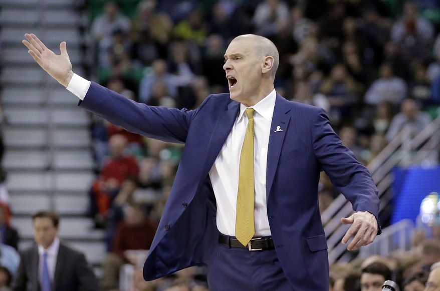 Dallas Mavericks head coach Rick Carlisle shouts to his team in the first half during an NBA basketball game against the Utah Jazz Friday, Dec. 16, 2016, in Salt Lake City. (AP Photo/Rick Bowmer)