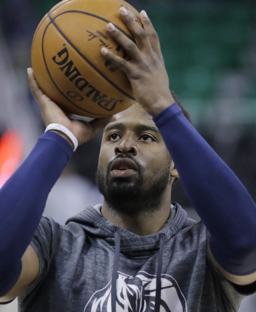 Dallas Mavericks guard Wesley Matthews (23) shoots during practice before an NBA basketball game against the Utah Jazz, Friday, Dec. 16, 2016, in Salt Lake City. (AP Photo/Rick Bowmer)