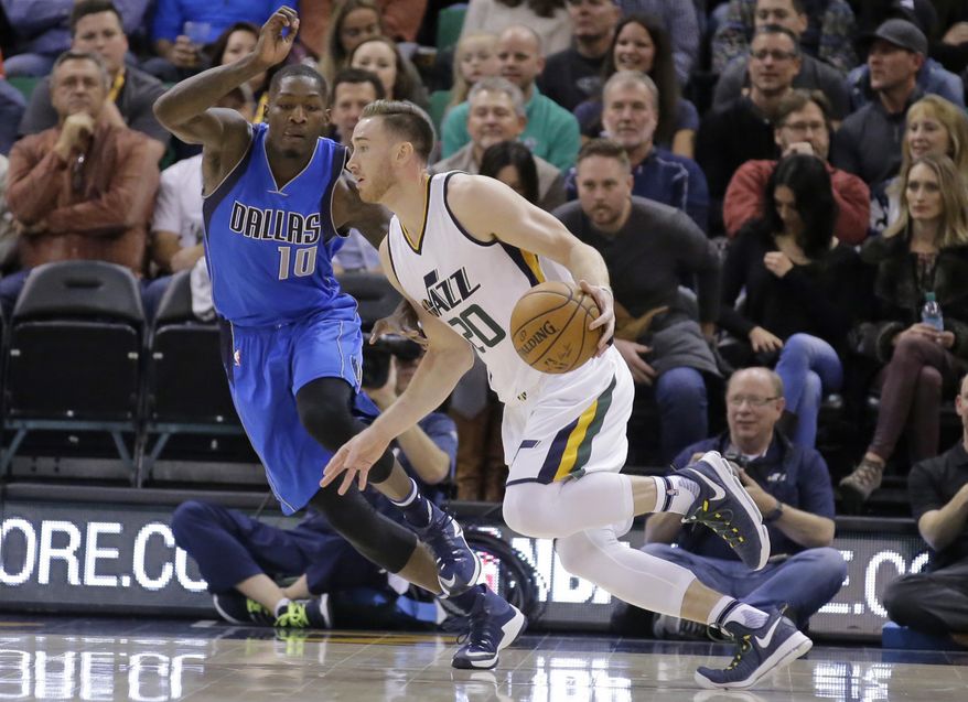 Utah Jazz forward Gordon Hayward (20) drives around Dallas Mavericks forward Dorian Finney-Smith (10) in the first half during an NBA basketball game Friday, Dec. 16, 2016, in Salt Lake City. (AP Photo/Rick Bowmer)