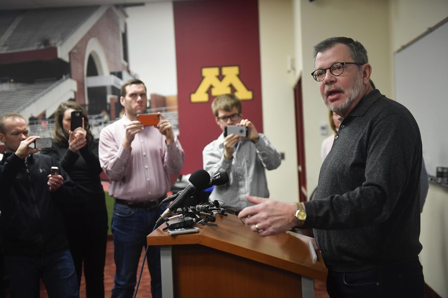 University of Minnesota President Eric Kaler speaks to members of the media Saturday, Dec. 17, 2016, after players announced the end of their boycott of the Holiday Bowl in Minneapolis. The team will play in the Holiday Bowl, reversing a threat to boycott the game because of the suspension of 10 players accused of sexual assault. (Aaron Lavinsky/Star Tribune via AP)