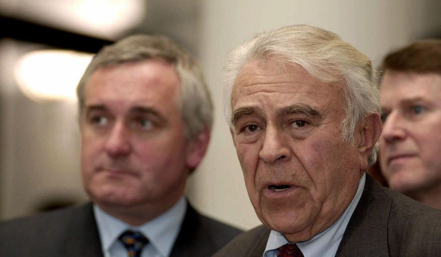 FILE- In this Jan. 29, 2001 file photo, Rep. Benjamin Gilman, front right, (R-NY), leads a high level U.S. congressional delegation to Dublin, Ireland for consultative talks with Irish Prime Minister Bertie Ahern, left, and members of Ahern's government. Gilman, who chaired the House Committee on International Relations in the 1990s, died Saturday, Dec. 17, 2016, at a Veterans Affairs facility in Wappingers Falls, N.Y. He was 94. (AP Photo/John Cogill, File)