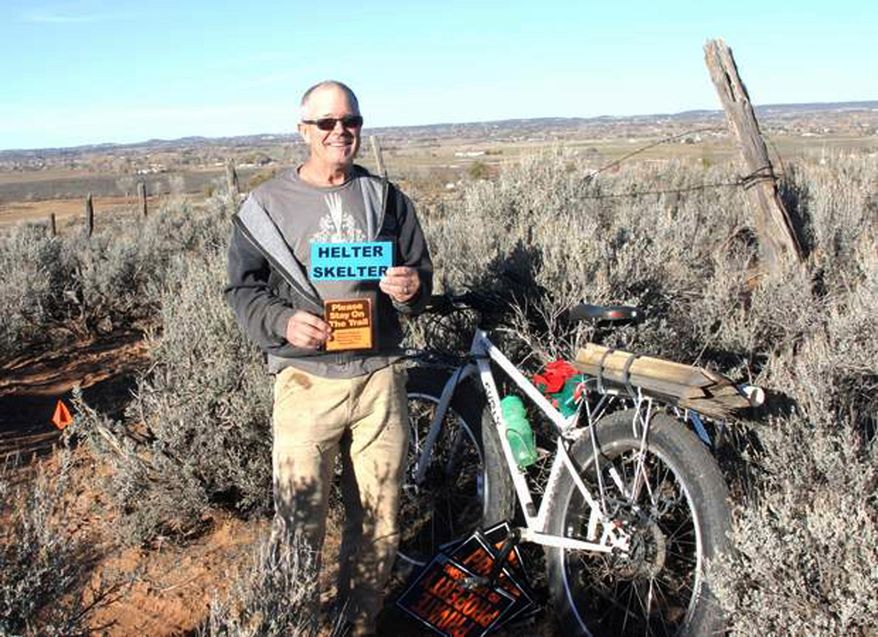ADVANCE FOR USE ON SATURDAY, DEC. 17, 2016 AND THEREAFTER In this undated photo, Keith Evans is shown amid the network of single-track trails that he has built on his land near Cortez, Colo. The trails are open to the public. (Jim Mimiaga/The Journal via AP)