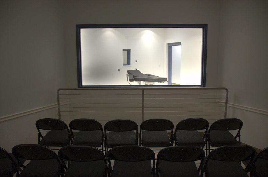 This Nov. 10, 2016 photo released by the Nevada Department of Corrections shows the viewing room looking toward the newly completed execution chamber at Ely State Prison in Ely, Nev. Nevada hasn't carried out an execution since 2006, and two state lawmakers have proposed abolishing capital punishment altogether. (Nevada Department of Corrections via AP)