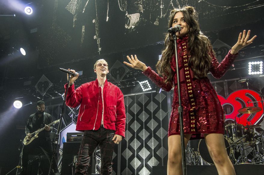Machine Gun Kelly, left, and Camila Cabello perform at Y100&#x27;s iHeartRadio Jingle Ball 2016 at BB&amp;amp;T Center on Sunday, Dec. 18, 2016, in Sunrise, Fla. (Photo by Amy Harris/Invision/AP)
