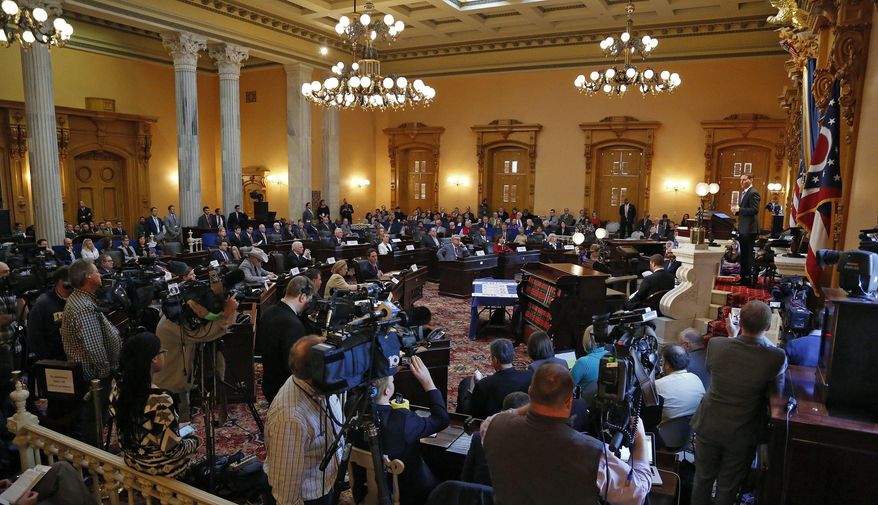 Ohio Treasurer Josh Mandel speaks in Columbus, Ohio, Monday, Dec. 19, 2016. All 18 of Ohio's Electoral College members voted Monday for Republican Donald Trump despite opposition by protesters outside the state capitol building. (Kyle Robertson/The Columbus Dispatch via AP)