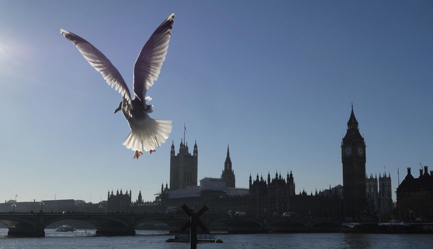 FILE - This Nov. 29, 2016 file photo shows seagulls waiting for tourists to feed them on the South Bank of the River Thames, in London. Currency changes in the wake of Brexit has made the United Kingdom a little more affordable for some international travelers. (AP Photo/Alastair Grant, File)