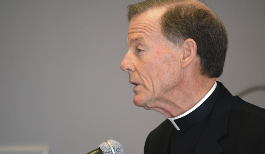 Santa Fe Archbishop John C. Wester speaks out against a proposed food tax in New Mexico at the Archdiocese of Santa Fe in Albuquerque, N.M., Tuesday, Dec. 20, 2016. A proposal to reinstate a food tax in New Mexico is drawing strong opposition from the Roman Catholic church and anti-poverty groups over concerns such a plan would raise grocery prices largely on the state's poor. (AP Photo/Russell Contreras)