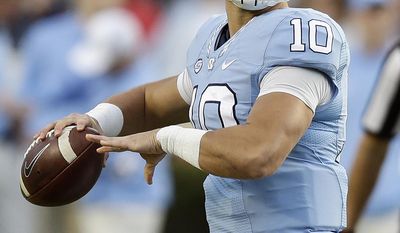 FILE - In this Nov. 19, 2016, file photo, North Carolina quarterback Mitch Trubisky (10) looks to pass against The Citadel during the first half of an NCAA college football game in Chapel Hill, N.C. Trubisky is focusing more on playing Stanford in the Sun Bowl than the NFL decision that awaits. The junior is projected as a possible first-round draft pick if he skips his final season with the Tar Heels. (AP Photo/Gerry Broome, File)