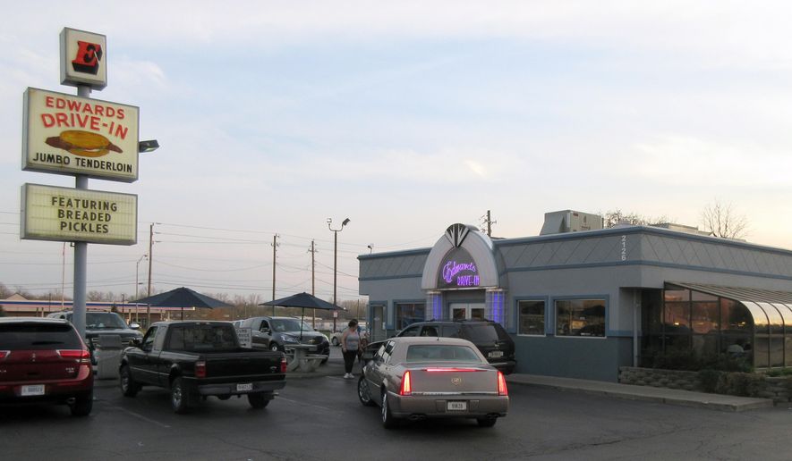 FILE -This April 18, 2016 file photo shows Edwards Drive-In, an Indianapolis eatery known for its pork tenderloin, a local specialty. The drive-in opened in the late 1950s and reflects the look and feel of the era. (AP Photo/Beth J. Harpaz, File)