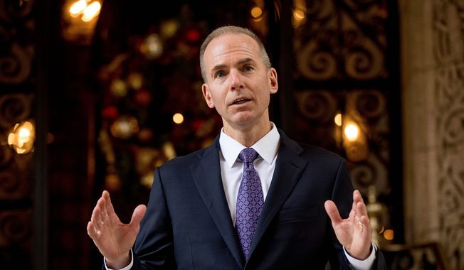 Boeing CEO Dennis Muilenburg speaks to members of the media after meeting with President-elect Donald Trump at Mar-a-Lago, in Palm Beach, Fla., Wednesday, Dec. 21, 2016. (AP Photo/Andrew Harnik)