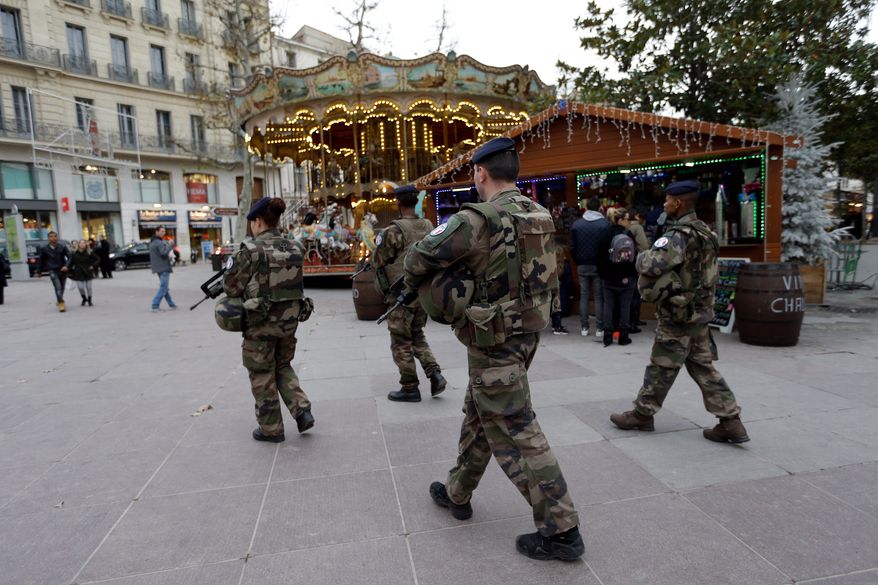 French soldiers were on patrol at the Christmas market in Marseille this week after the deadly attack Monday evening in Berlin. The Islamic State is using propaganda to self-radicalize terrorists using low-cost, high-impact resources such as trucks and knives. (Associated Press)