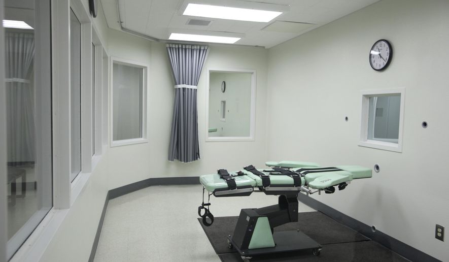 FILE - This Sept. 21, 2010, file photo shows the death chamber of the new lethal injection facility at San Quentin State Prison in San Quentin, Calif. Only 30 people were sentenced to death in the United States in 2016, the lowest number since the early 1970s and a further sign of the steady decline in use of the death penalty. The number is a sharp drop from the 49 death sentences last year and just a fraction of the peak of 315 in 1996, according to a report from the Death Penalty Information Center, a nonprofit organization that opposes capital punishment and tracks the issue. (AP Photo/Eric Risberg, File)