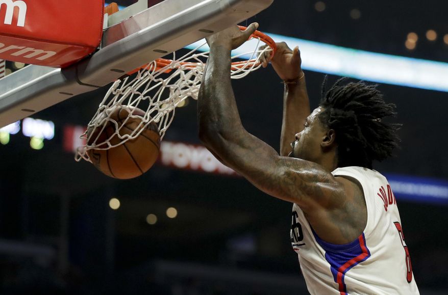 Los Angeles Clippers center DeAndre Jordan dunks against the Denver Nuggets during the first half of an NBA basketball game in Los Angeles, Tuesday, Dec. 20, 2016. (AP Photo/Chris Carlson)