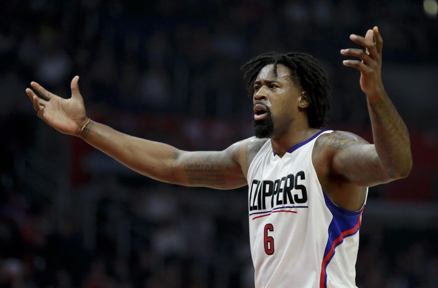 Los Angeles Clippers center DeAndre Jordan reacts during the first half of an NBA basketball game against the Denver Nuggets in Los Angeles, Tuesday, Dec. 20, 2016. (AP Photo/Chris Carlson)