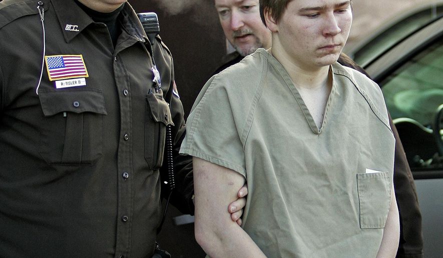 ADVANCE FOR USE SATURDAY, DEC. 24 - FILE - In this March 3, 2006, file photo, Brendan Dassey, is escorted out of a Manitowoc County Circuit courtroom in Manitowoc, Wis. A federal magistrate judge had ruled in August that investigators coerced Brendan Dassey, who was 16 years old at the time and suffered from cognitive problems, into confessing. He was sentenced to life in prison in 2007 in the slaying of photographer Teresa Halbach. He had told detectives he helped his uncle, Steven Avery, rape and kill Halbach at the Avery family salvage yard in Manitowoc County. Dassey's release appeared imminent until the 7th U.S. Circuit Court of Appeals in Chicago stepped in at the last minute and decided to keep Dassey behind bars while state attorneys appealed a decision which overturned his conviction.(AP Photo/Morry Gash, File)