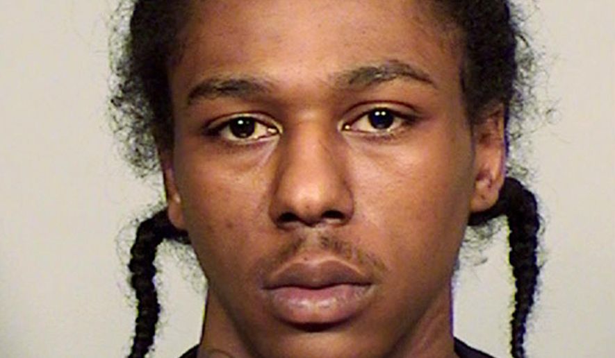 ADVANCE FOR USE SATURDAY, DEC. 24 - FILE - This undated file photo provided by the Milwaukee County Sheriff shows Sylville Smith. In August, a north side Milwaukee neighborhood erupted in violence following the police shooting of a young black man, Sylville Smith. Smith's death was the match that lit two nights of violence which left eight businesses burned, other properties looted and several officers and civilians injured. In a rare move, the officer that killed Smith, Dominique Heaggan-Brown, was charged in December with first-degree reckless homicide. (Milwaukee County Sheriff via AP, File)