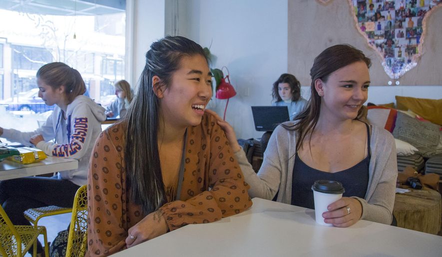 In this Dec. 14, 2016, photo, Colette Raptosh, 16, left, and Nora Harren, 17, students at Capital and Borah high schools respectively, talk about how they are organizing Women's March on Idaho because they realized nobody else was in Boise, Idah. Not able to vote in this year's election, the two wanted to do more than just post their views on social media. (Darin Oswald/Idaho Statesman via AP)