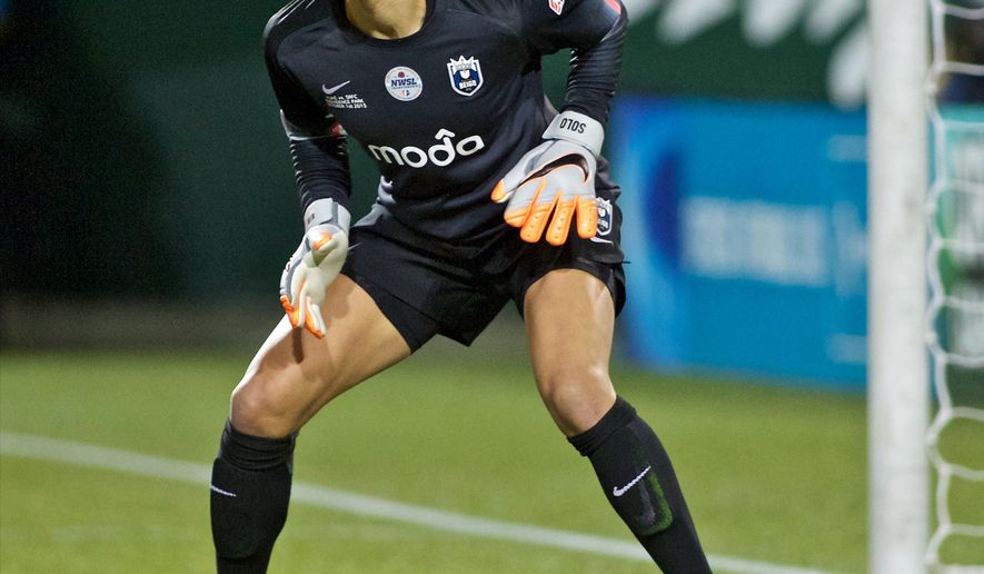 FILE - In this Oct. 1, 2015, file photo, Seattle Reign FC goalkeeper Hope Solo follows the action during the second half of the NWSL soccer championship match in Portland, Ore. Hope Solo says she hopes that someday she can return to the U.S. women&#39;s national team, but in the meantime she vows to keep fighting for equal pay for the players, Thursday, Dec. 22, 2016. (AP Photo/Craig Mitchelldyer, File)
