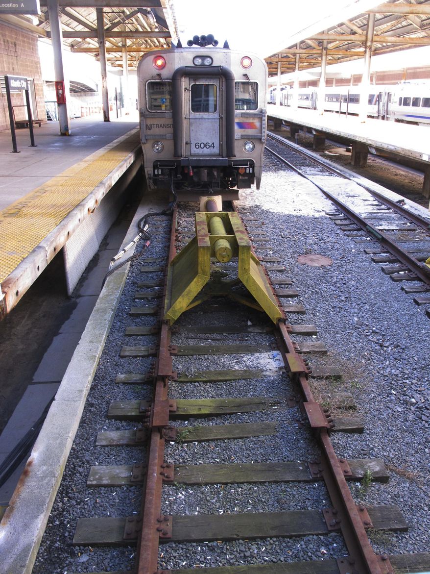 This Dec. 20, 2016 photo shows safety barriers called "bumping posts" at the end of the tracks at the Atlantic City, N.J., NJ Transit train station. The bumping posts at NJ Transit's Hoboken Terminal, site of a fatal crash in September, haven't been replaced in more than 100 years. NJ Transit tells The Associated Press it is in the process of hiring a consultant to help determine whether the barriers need to be replaced. (AP Photo/Wayne Parry)