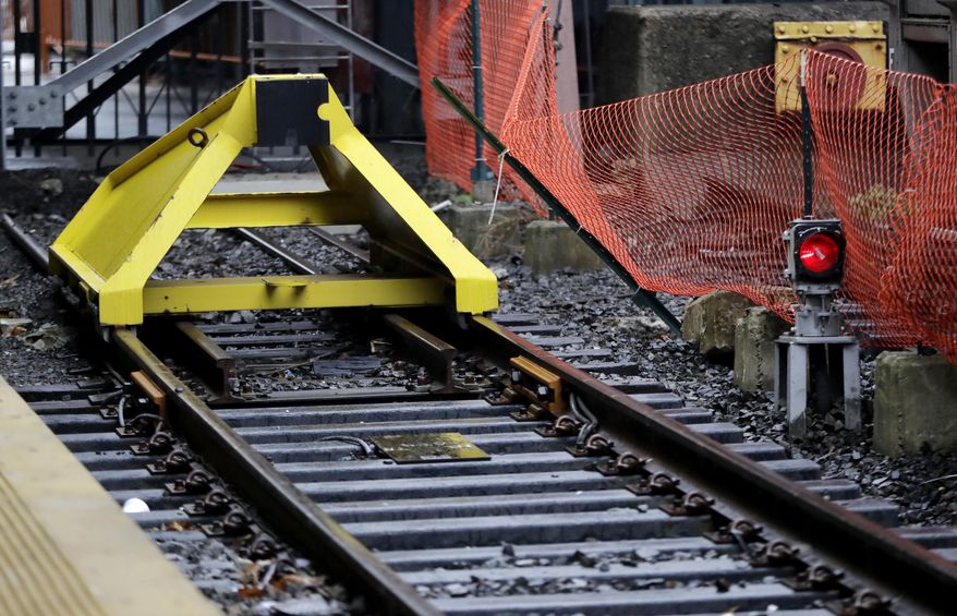 In a photograph taken Wednesday, Nov. 30, 2016, a bumping post sits on Track 15 at the Hoboken Train Terminal in Hoboken, N.J. The post on Track 15 is the only post, out of 17 tracks, which features a modern post designated to stop a runaway train. The other posts were installed more than 100 years ago and recently became relevant in the wake of the New Jersey Transit train crash that occurred Sept. 29, 2016. (AP Photo/Julio Cortez)