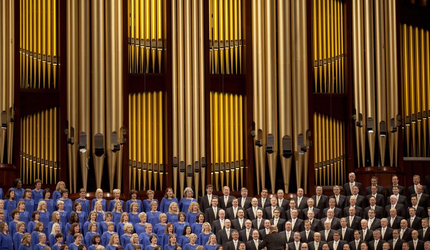 FILE - In this Oct. 3, 2015 file photo, The Mormon Tabernacle Choir sings during the opening session of the two-day Mormon church conference in Salt Lake City. The church announced on its website Thursday that the 360-member volunteer choir will sing at Trump’s swearing-in ceremony on January 20. (AP Photo/Kim Raff)