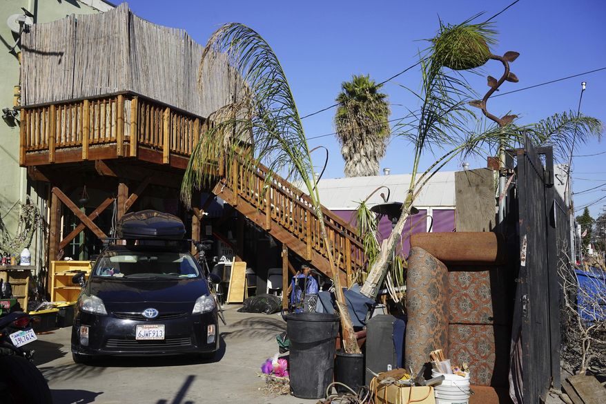 This Dec. 19, 2016 photo shows the exterior of an underground music club known as known as Purple 33 in the Playa Vista neighborhood of Los Angeles. About a week after 36 people died in a fire at an underground music party in Oakland, inspectors acting on a complaint discovered a makeshift nightclub and unpermitted living quarters concealed in a warehouse near Los Angeles International Airport. Authorities searching the drab, two-story building found an illegally constructed dance floor, paired with a bar and DJ booth. (AP Photo/Christine Armario)