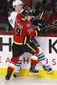 canucks_flames_hockey_51919.jpg
