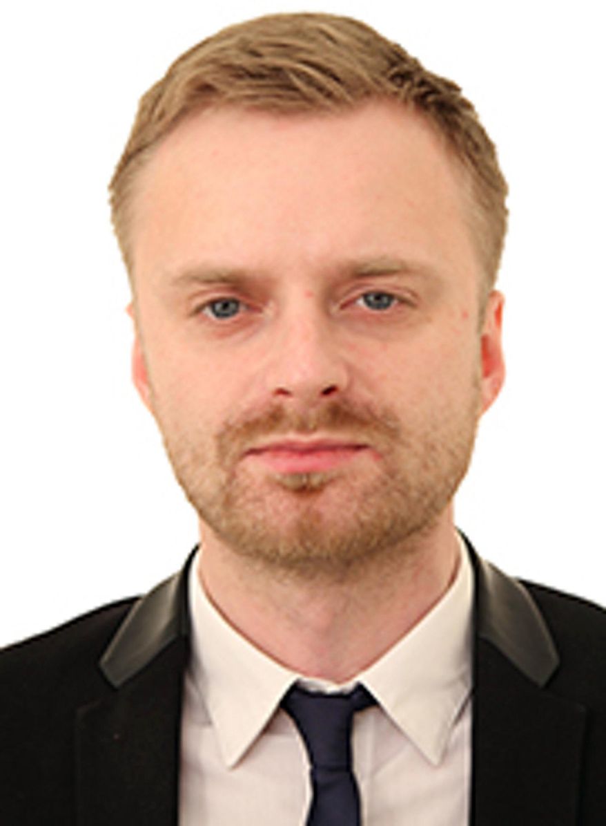 This undated photo released by Russian Channel One Press Service shows Channel One reporter Dmitrii Runkov. A Russian plane with 92 people aboard, including a well-known military band, crashed into the Black Sea on its way to Syria on Sunday, Dec. 25, 2016, minutes after takeoff from the resort city of Sochi, the Defense Ministry said. Russian journalists, including Runkov, were among 92 people on board the Tu-154 plane. (Russian Channel One Press Service Photo via AP)