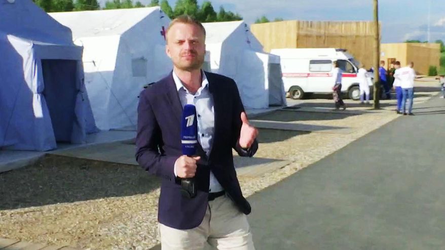 This undated photo released by Russian Channel One Press Service shows Channel One reporter Dmitrii Runkov. A Russian plane with 92 people aboard, including a well-known military band, crashed into the Black Sea on its way to Syria on Sunday, Dec. 25, 2016, minutes after takeoff from the resort city of Sochi, the Defense Ministry said. Russian journalists, including Runkov, were among 92 people on board the Tu-154 plane. (Russian Channel One Press Service Photo via AP)